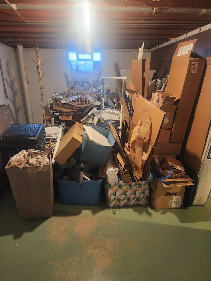 Roll-off dumpster container at job site for Construction Dumpster Rental in St. Francis